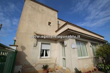 Casa singola con giardino
