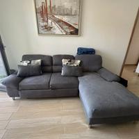 Divano letto tre posti con penisola