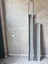 Binario portamoto e rampa di carico.