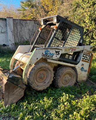 Bobcat 553 + benne