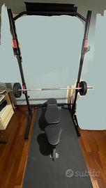 Rack + bilanciere + pesi + manubri