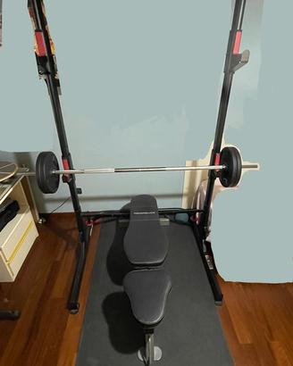 Rack + bilanciere + pesi + manubri