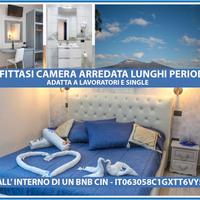 Camera attrezzata con bagno e frigo