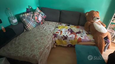 Divano letto tre posti a L