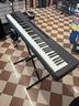 tastiera-yamaha-p145b-cuffia-oqan-qhp10