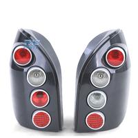 FANALI PER OPEL ZAFIRA A 99-05 HELLA NERO