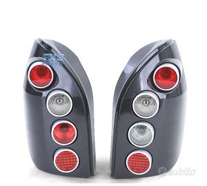 FANALI PER OPEL ZAFIRA A 99-05 HELLA NERO