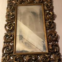 Cornice dorata con specchio antichizzato