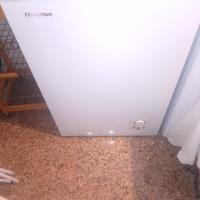 Congelatore a pozzetto asciugatrice e violino