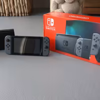 Nintendo Switch V2 Grigia + 6 Giochi + Custodia -