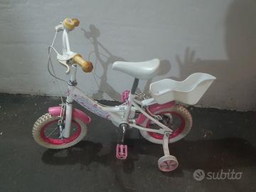 Bici per bambina con rotelle 