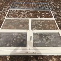 Finestrone in alluminio con grata ferro zincato