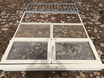 Finestrone in alluminio con grata ferro zincato