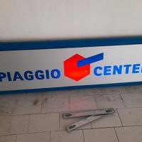 Insegna luminosa piaggio center