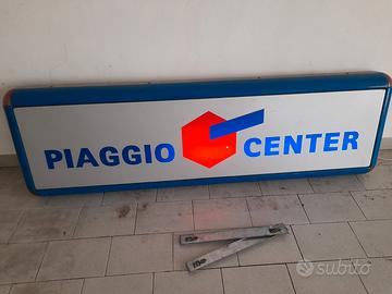 Insegna luminosa piaggio center