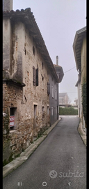 Casa da ristrutturare con giardino e pertinenza