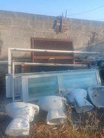 Porte in allumino e sanitari completi