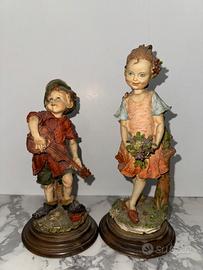 Coppia di bambini Giuseppe Armani