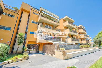 PRESTIGIOSO APPARTAMENTO CON GIARDINO PRIVATO