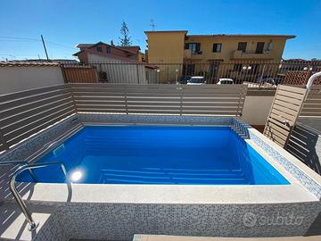 Appartamento in ville a schiera con piscina privat