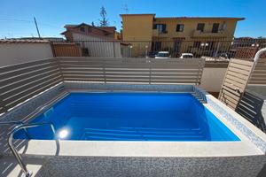 Appartamento in ville a schiera con piscina privat