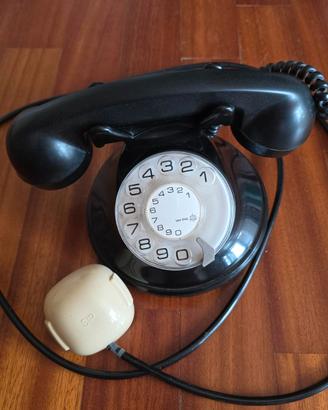Telefono fisso vintage a disco in plastica nera