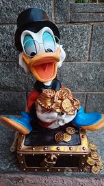 Paperone Disney sul forziere