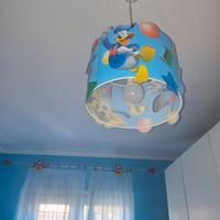 Tenda bastone e lampadario