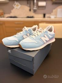 Sneakers New Balance azzurre e rosa