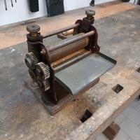 Vecchia laminatrice pressa