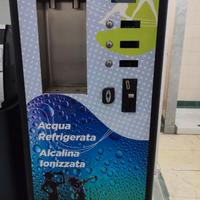 distributore acqua con gettoniera