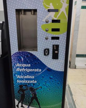 distributore acqua con gettoniera