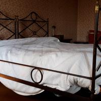 Letto in ferro battuto antico