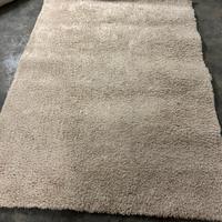 Tappeto beige chiaro pelo corto 140x200