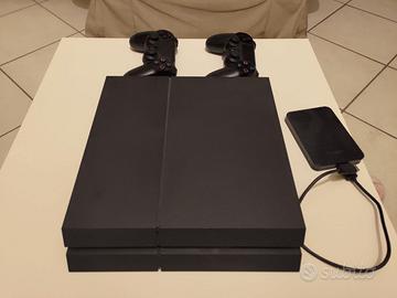 PS4 Slim 1,5 TB + 2 joypad + 2 giochi