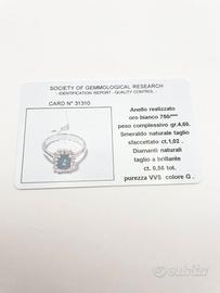 Anello oro 18KT con smeraldo 1.02 e diamanti 0.56