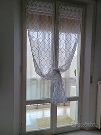 porta finestra in legno con doppi vetri