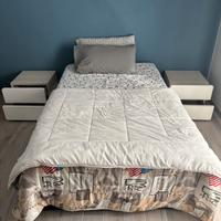 Letto una piazza e mezza con i comodini