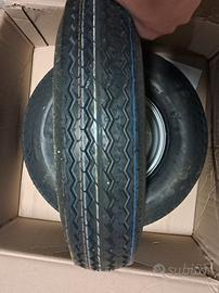 gomme e cerchi 110/95-8