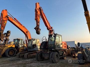 HITACHI Escavatore gommato ZX140W - 3