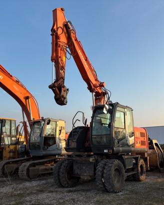 HITACHI Escavatore gommato ZX140W - 3