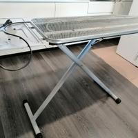Asse da stiro con piano riscaldato