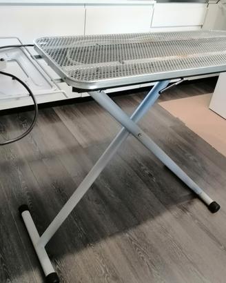Asse da stiro con piano riscaldato