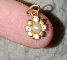 oro ciondolo