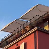 Tende a bracci elettriche