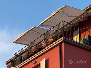 Tende a bracci elettriche