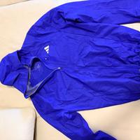 Adidas Adizero giacca a vento con tecnologia Wind.