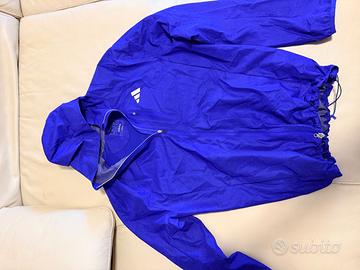 Adidas Adizero giacca a vento con tecnologia Wind.