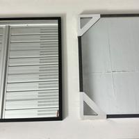Specchi quadrati con cornice