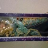 Bambola da collezione in ceramica